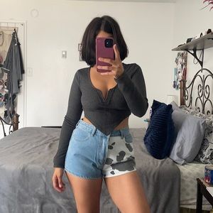 High waisted denim cow print shorts